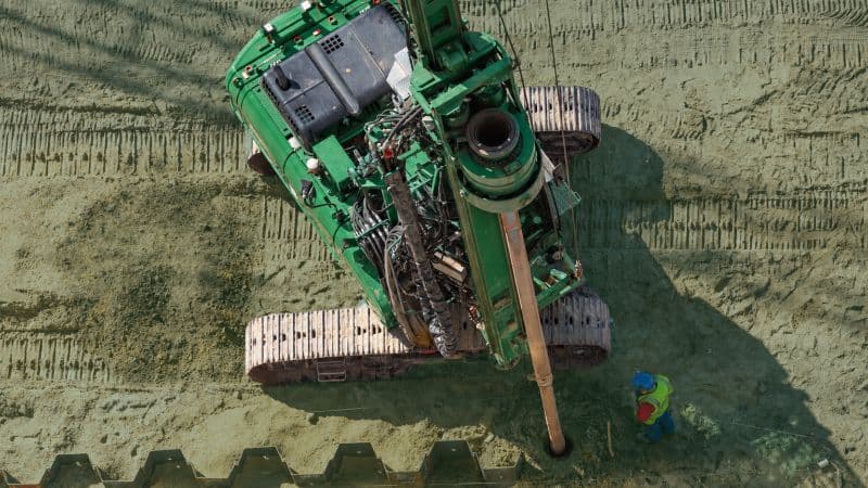 Overhead Green Drilling Rig On Construction Site